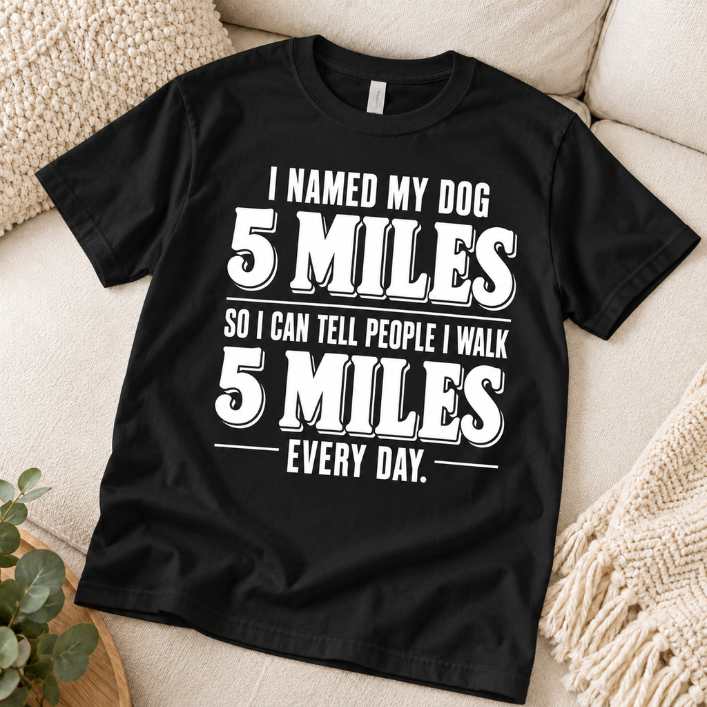Black T-shirt front on cream sofa - I Named My Dog 5 Miles